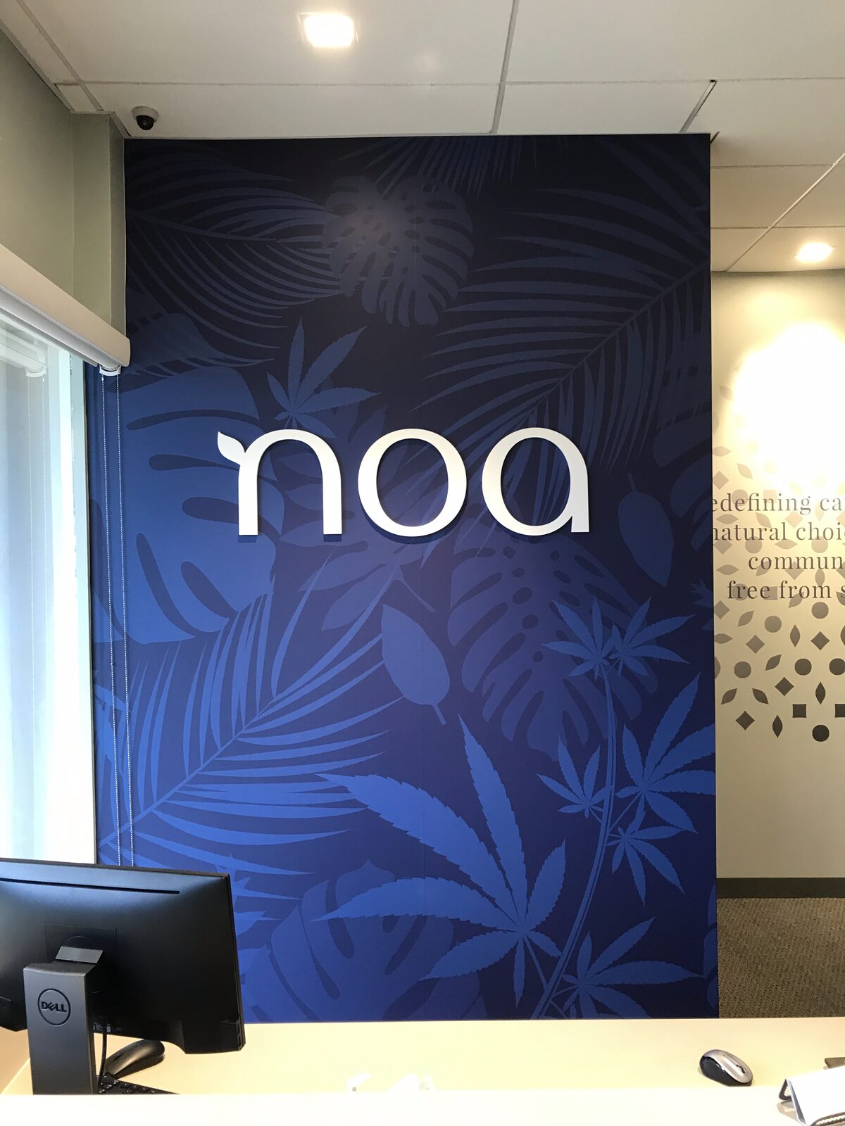 A backlit dimensional-lettering feature wall by Studio OntheRock